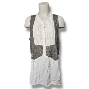 Black brand blouse with sequins and long split back. XL